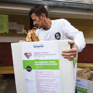 an MIT volunteers delivers supplies to a local nonprofit