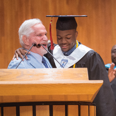 Paul awarding an impact scholarship